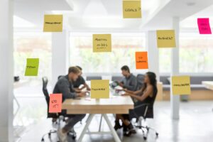 Group of young entrepreneurs working toghether in a coworking space